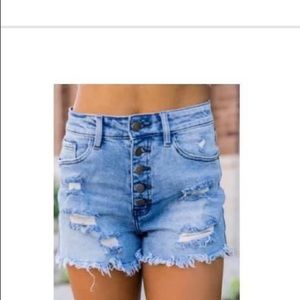 Pink lily distressed jean shorts